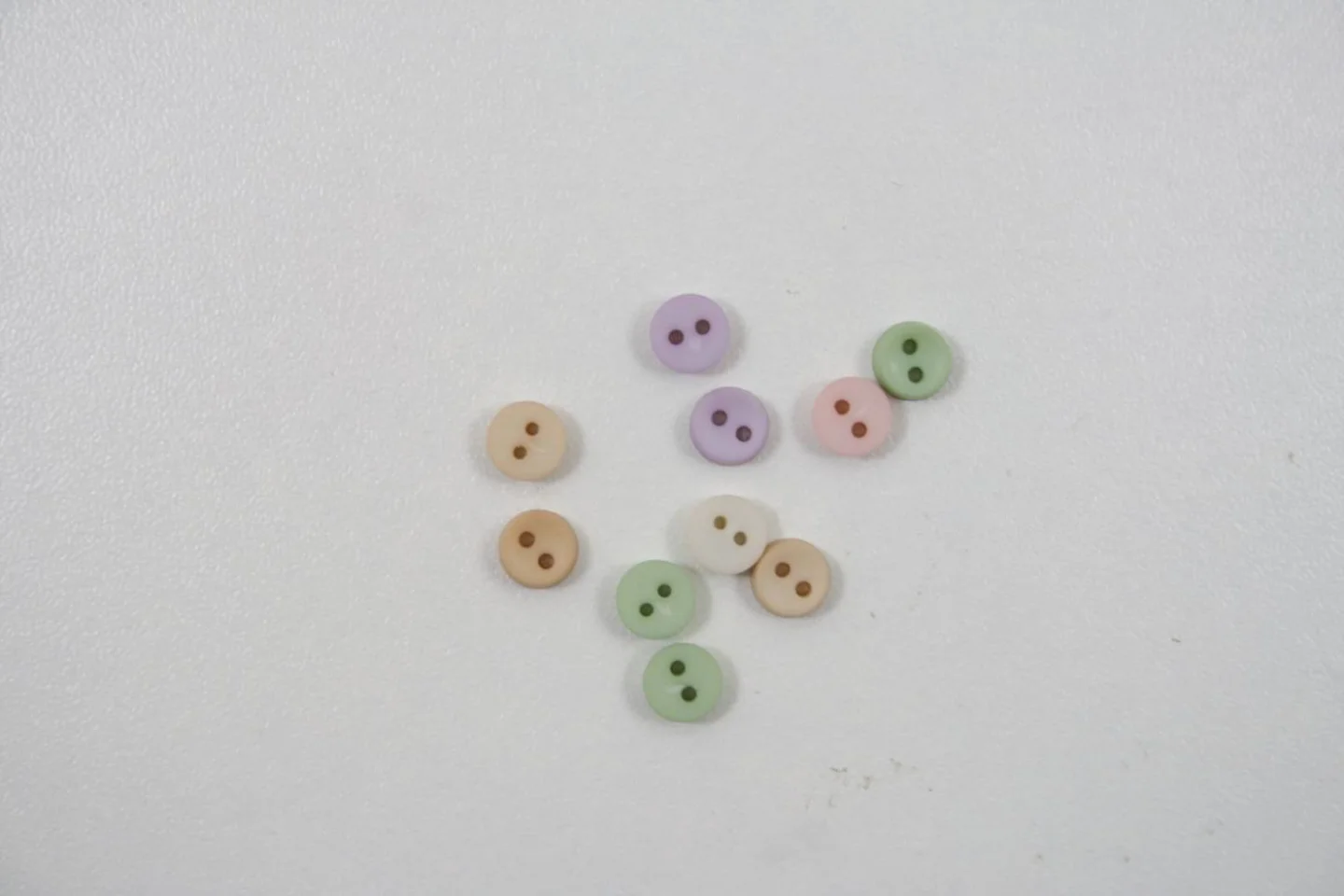 Mini sierknoopjes-rond-7 mm-pastel-Per 1.