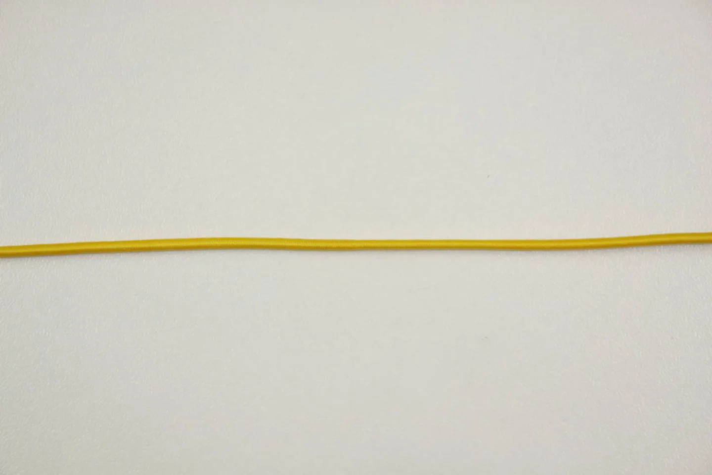 Elastisch koord-Curry-elastiek- geel- ok.